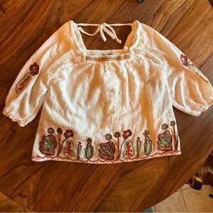 Embroidered White Blouse with Floral Accents